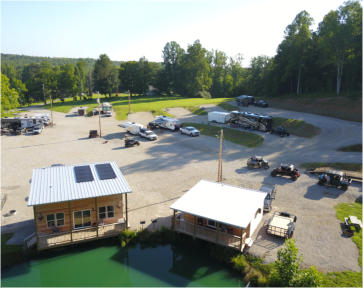 a great view of our cabins showing the solar panels on top of our largest cabin